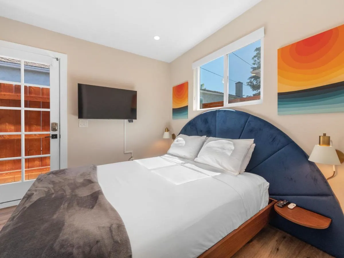 Image 1 of Beach Bungalow Perfection – Private Patios, BBQ walk2beach & Pet Friendly!