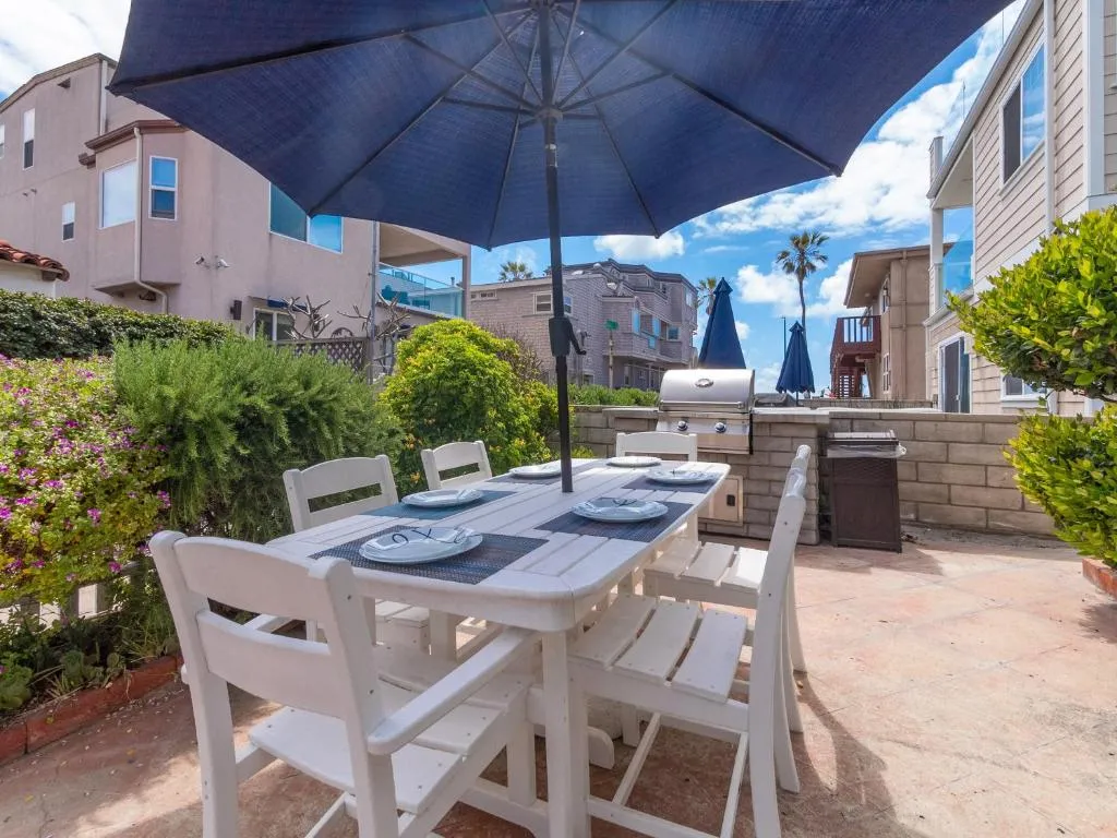 Image of Stunning beach home – steps2sand, AC, Large Patio and Fast Wifi!